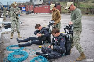 Divers from the United States and Ukraine inspect hydraulic structures in the water area of the port of Yuzhny