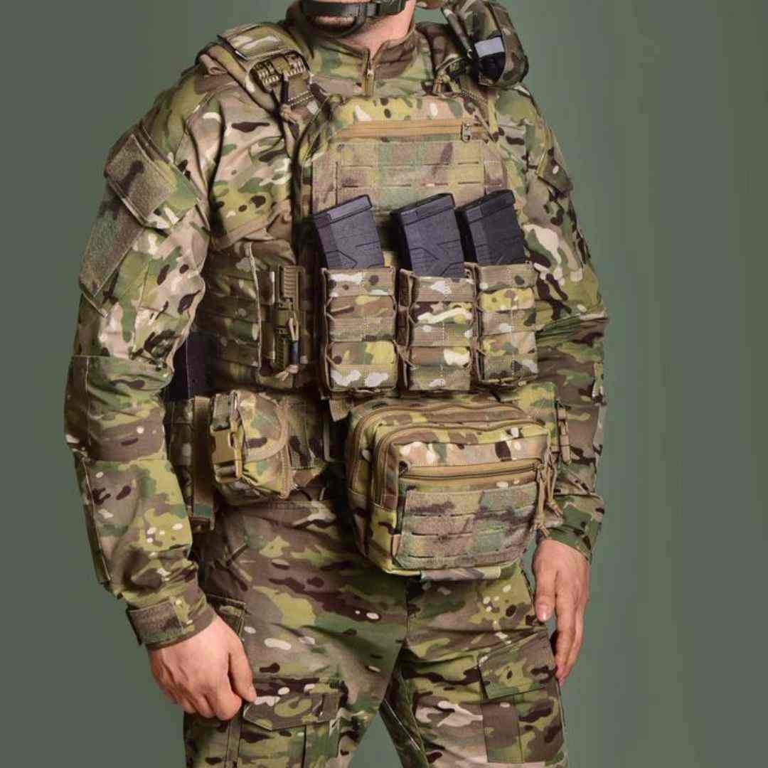 Man in camouflage wearing a body armor vest with multiple pouches