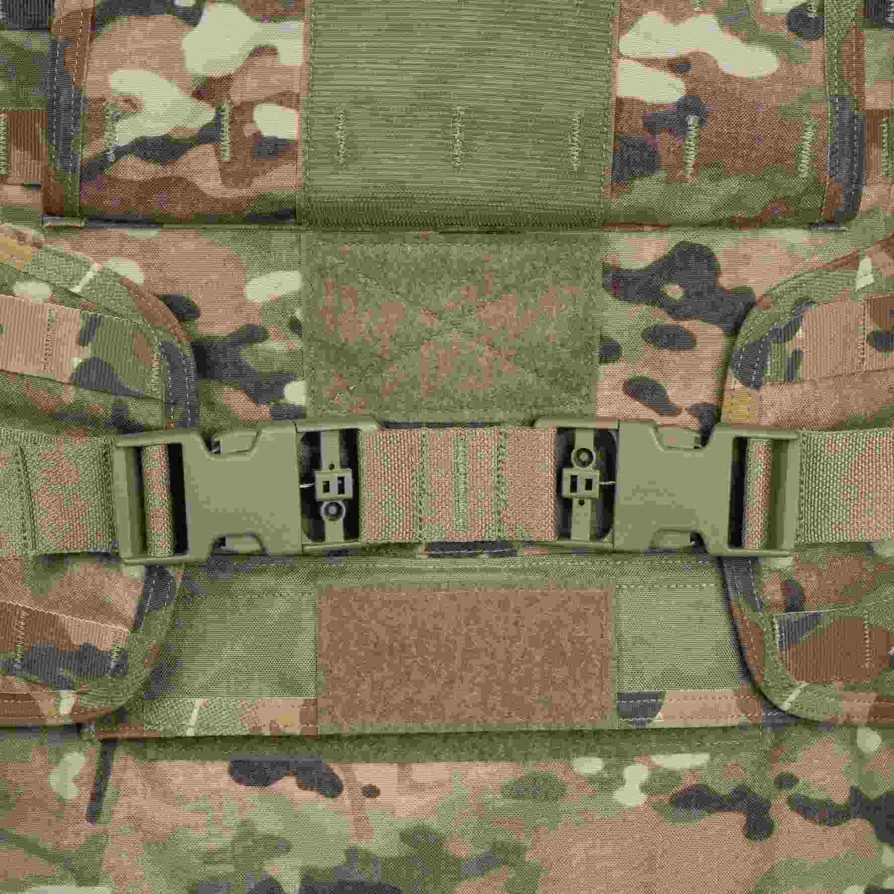 Macro photo of a Multicam body armor vest with two green plastic buckles on the straps
