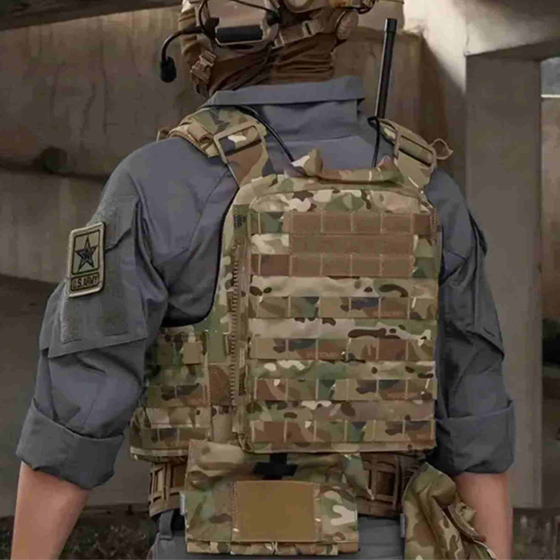 Soldier wearing a camouflage body armor vest over a shirt