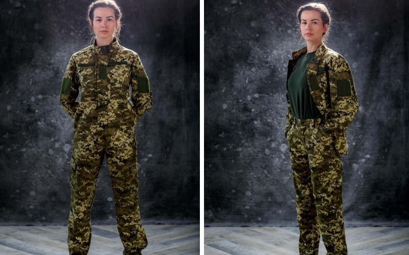 A woman poses in a modern military uniform appropriate for her gender