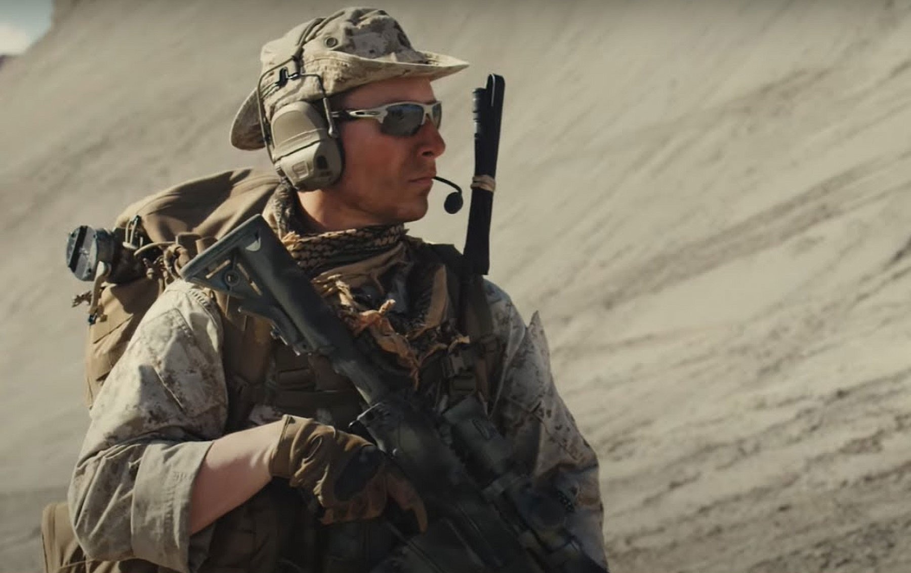 Soldier in the desert wearing an Ops-Core headset
