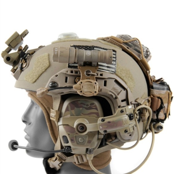 Tactical helmet on a mannequin head with an attached flashlight and headset