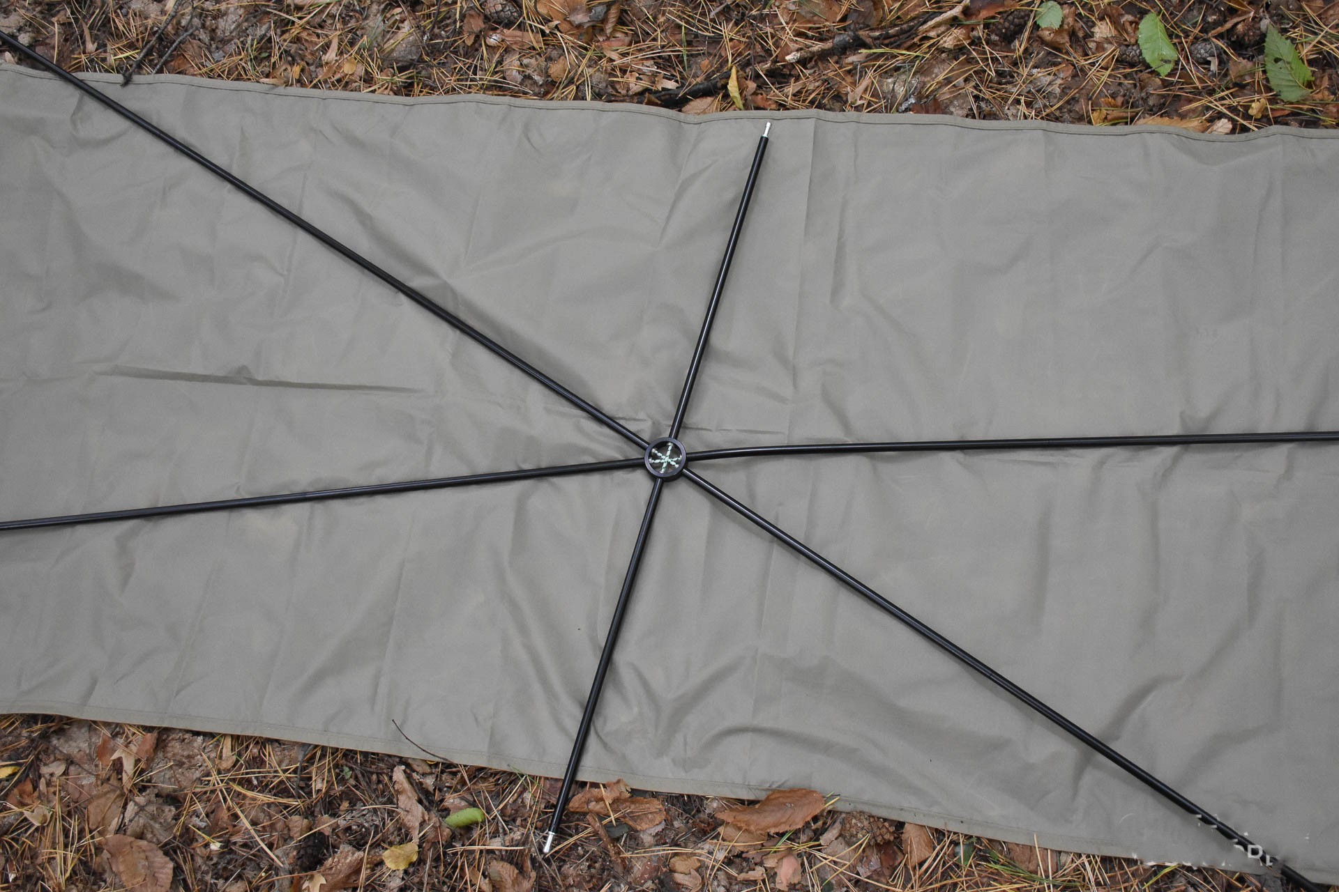 The assembled cross-shaped frame is ready for installation
