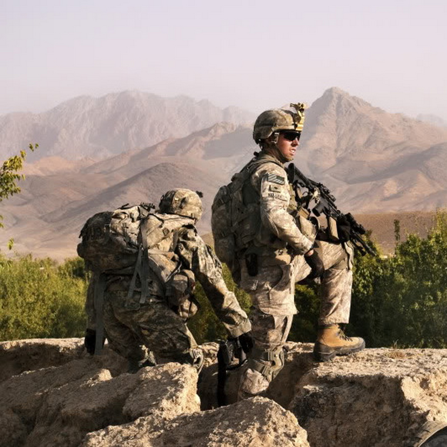 American soldiers wearing mid-season combat boots during a tactical exercise