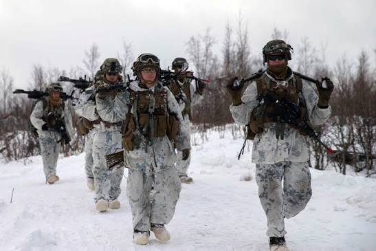 A group of soldiers returns from a winter mission