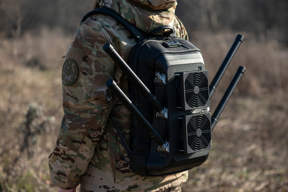 Mobile electronic warfare backpack on a soldier's back
