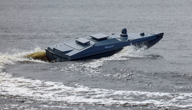 The marine drone begins a turn on the water's surface